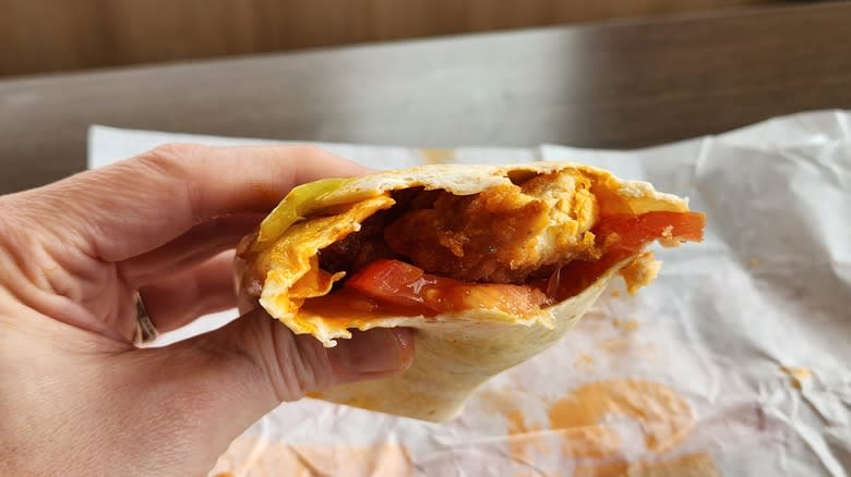 eating a Burger King Fiery Buffalo Royal Crispy Wrap