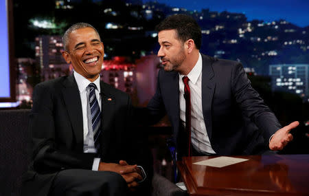 U.S. President Barack Obama laughs as he is interviewed by Jimmy Kimmel in a taping of the Jimmy Kimmel Live! show in Los Angeles October 24, 2016. REUTERS/Kevin Lamarque