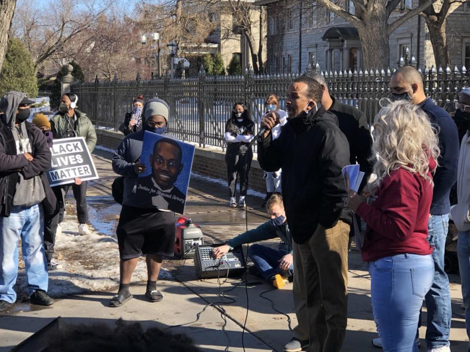 Bayle Adod Gelle speaks to a crowd