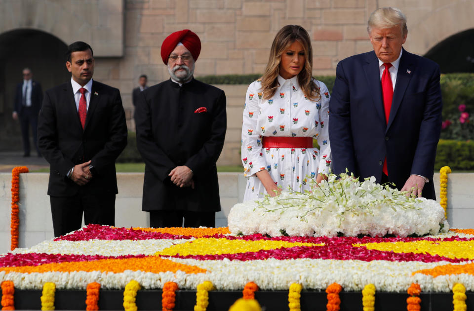 U.S. President Donald Trump and first lady Melania Trump attend a wreath laying ceremony at Mahatma Gandhi's memorial at Raj Ghat in New Delhi, India, February 25, 2020. REUTERS/Al Drago