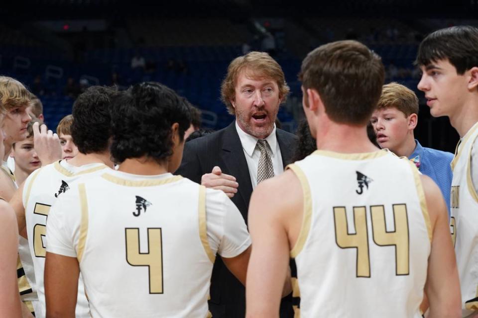 Jayton head coach Ryan Bleiker talks to his team during a time out against Fayetteville in a Class 1A state semifinal on Thursday, March 7, 2024 at the Alamodome in San Antonio, Texas. Jayton defeated Fayetteville 65-26. University Interscholastic League
