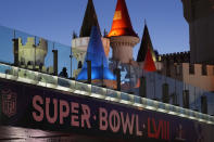 A sign for Super Bowl 58 adorns a pedestrian walkway across the Las Vegas Strip ahead of the Super Bowl, Tuesday, Jan. 30, 2024, in Las Vegas. Las Vegas is scheduled to host the Super Bowl 58 on Sunday, Feb. 11, 2024. (AP Photo/John Locher)