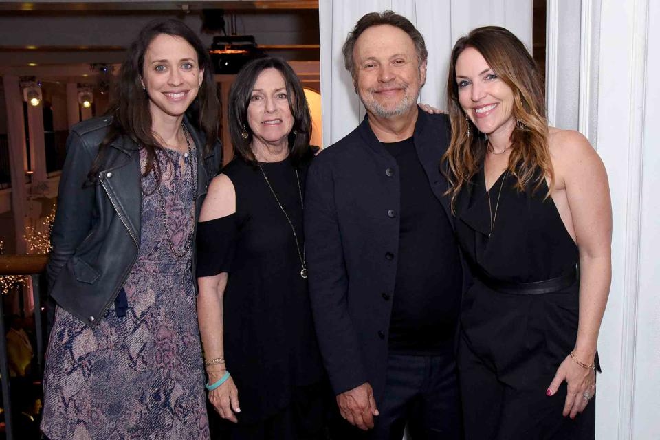 <p>Presley Ann/Getty</p> Lindsay Crystal, Janice Crystal, Billy Crystal, and Jennifer Crystal Foley attend the Opening Night Gala at the 2019 10th Annual TCM Classic Film Festival on April 11, 2019 in Hollywood, California.