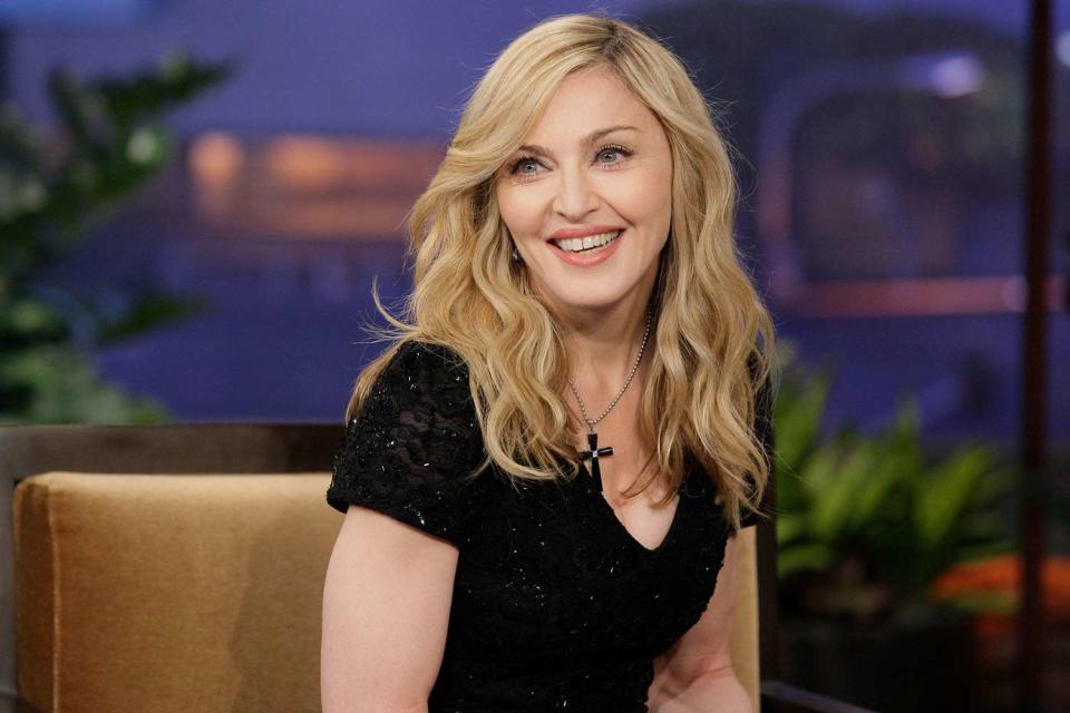 <p>aul Drinkwater/NBCU Photo Bank/NBCUniversal via Getty</p> Madonna in Los Angeles in January 2012