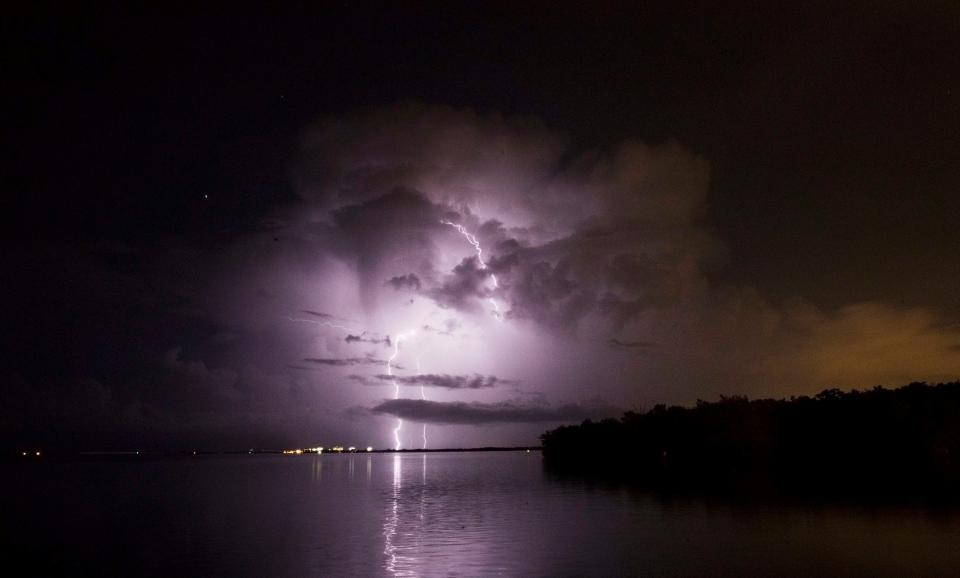 Bolts of lightning strike near the Sanibel Causeway on Friday 8/10/2018. Photographed using a Canon 1DX with a 1250 ISO at 30 sec at f/10. Shot from a safe distance with a wide angle lens.  