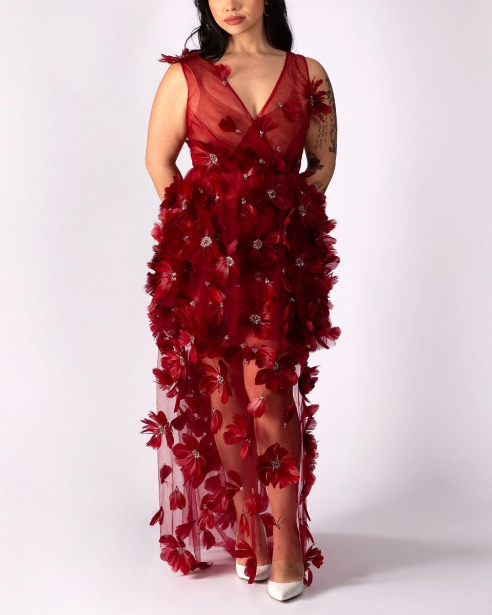 <p><a href="https://lesleyhampton.com/products/burgundy-3d-feather-mini-dress-pre-sale-copy?pr_prod_strat=e5_desc&pr_rec_id=e51faffdd&pr_rec_pid=7308185763922&pr_ref_pid=7306063839314&pr_seq=uniform" rel="nofollow noopener" target="_blank" data-ylk="slk:Shop Now;elm:context_link;itc:0;sec:content-canvas" class="link ">Shop Now</a></p><p>Feather Floral Maxi</p><p>lesleyhampton.com</p><p>$1115.00</p>