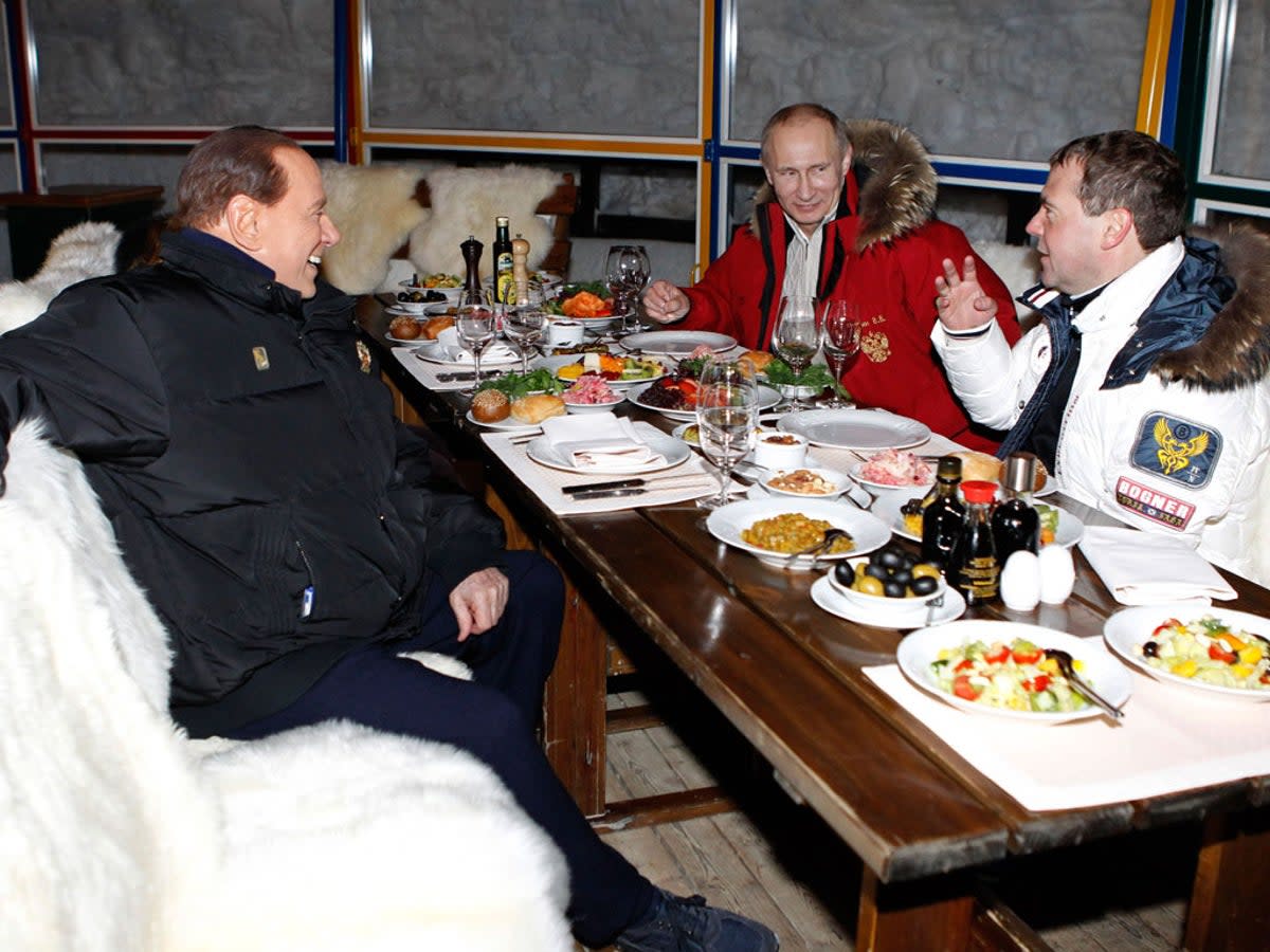 Berlusconi would drop in on Putin for a spot of skiing and a banquet or two (Getty Images)