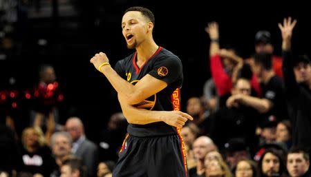 Feb 19, 2016; Portland, OR, USA; Golden State Warriors guard Stephen Curry (30) reacts to having a foul called on him during the third quarter of the game against the Portland Trail Blazers at the Moda Center at the Rose Quarter. The Blazers won the game 137-105. Mandatory Credit: Steve Dykes-USA TODAY Sports