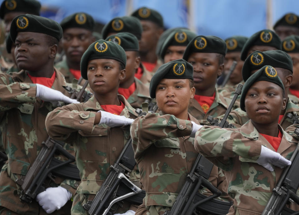 Members of the presidential guard march during the Armed Forces Day in Richards Bay, South Africa, Tuesday, Feb. 21, 2023. The parade took place as a naval exercise was underway off the east coast of the country with Russian and Chinese navies. (AP Photo/Themba Hadebe)