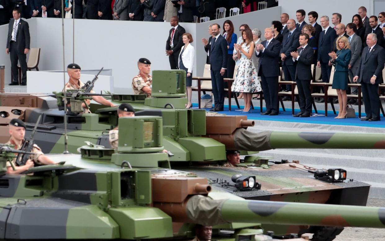 Donald Trump was impressed by France's military display on Bastille Day - AFP