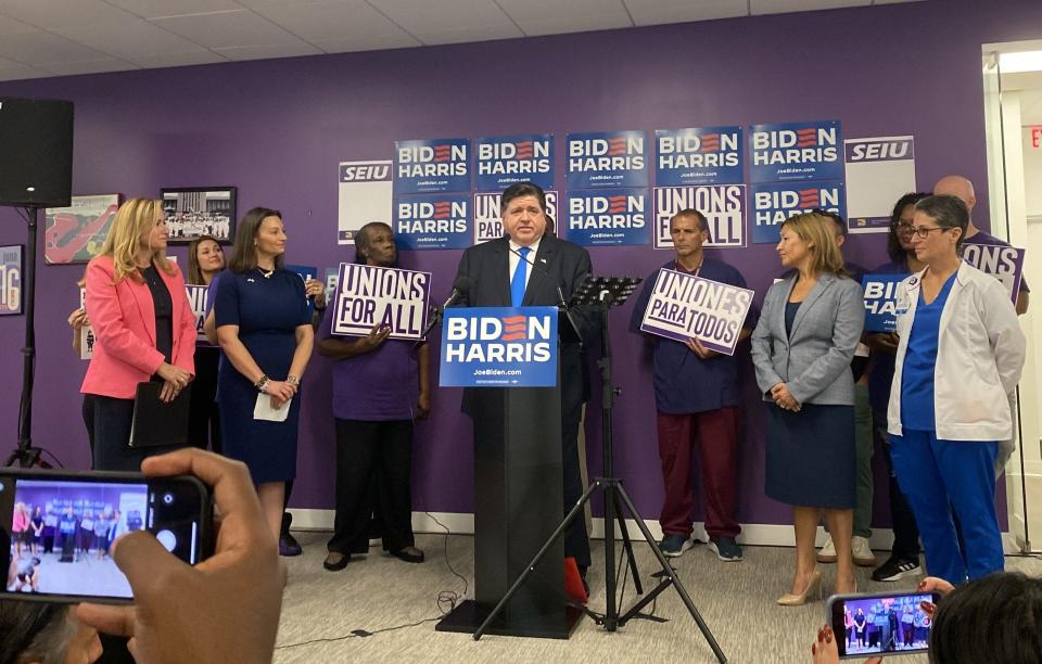 Illinois Gov. J.B. Pritzker speaks with Florida Democrats and the Biden-Harris campaign in Miami on Tuesday, Nov. 7, the day before both the third Republican presidential debate and a rally for former President Donald Trump.