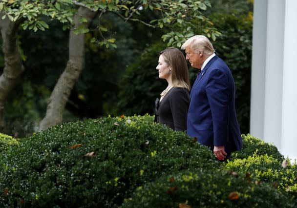 PHOTO: President Donald Trump arrives with Amy Coney Barrett, nominee for associate justice of the U.S. Supreme Court, during an announcement ceremony at the White House in Washington, D.C., Sept. 26, 2020. (Shawn Thew/EPA/Bloomberg via Getty Images)