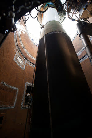 A Minuteman III missile booster is lowered into the tube at Launch Facility during emplacement for Glory Trip-215 at Vandenberg Air Force Base, California, U.S., February 25, 2015. Picture taken February 25, 2015. U.S. Air Force/Michael Peterson/Handout via REUTERS