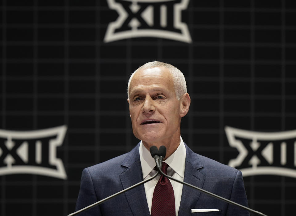 FILE - Big 12 commissioner Brett Yormark addresses the media during the NCAA college Big 12 women's basketball media day Oct. 17, 2023, in Kansas City, Mo. Big 12 schools will share in a record $470 million in revenue distribution, which the conference announced Friday, May 31, 2024, when wrapping up its first spring meetings as a 14-team league and before growing by two more teams. Yormark said the conference is more relevant than it has ever been. (AP Photo/Charlie Riedel, File)