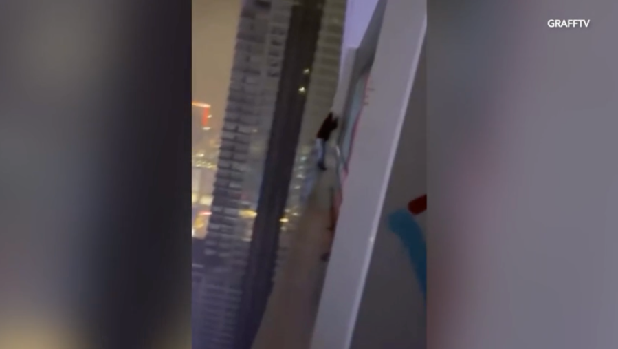 Video shows daredevil tagger on ledge of downtown L.A. skyscraper