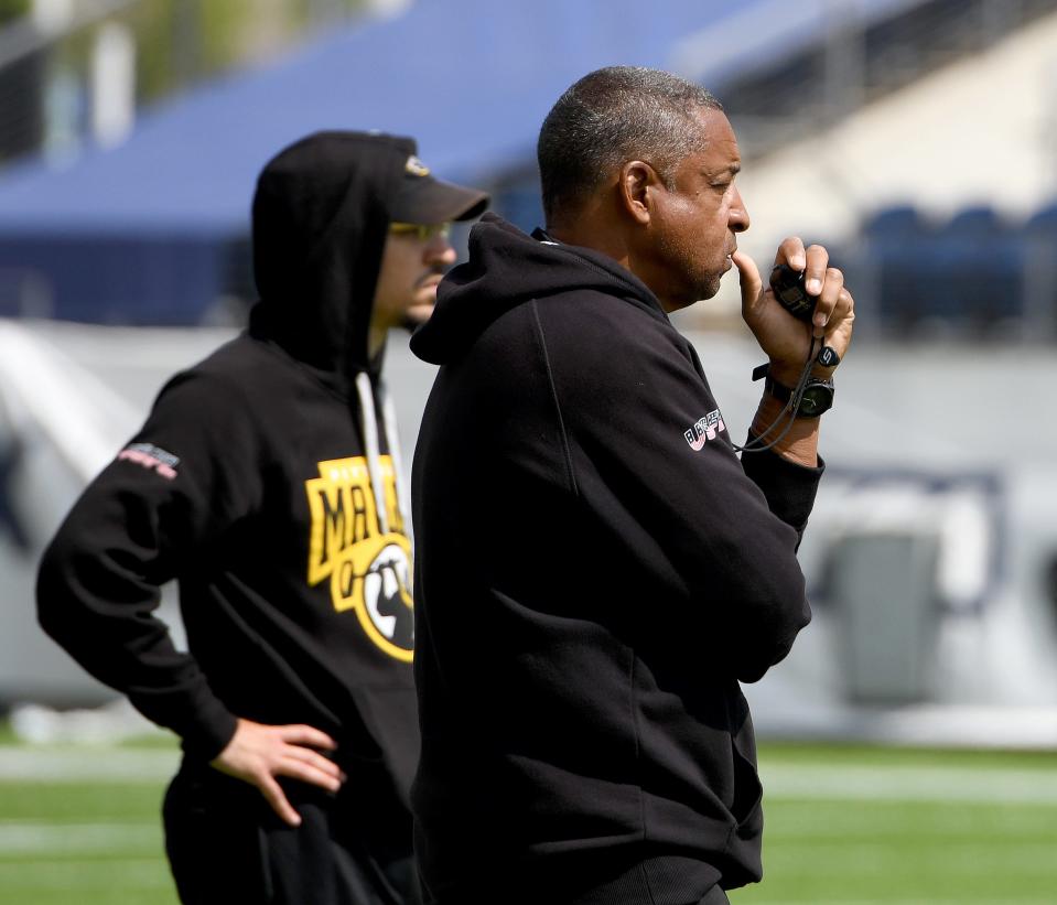 Pittsburgh Maulers head coach Ray Horton, right, with his son, defensive coordinator Jarren Horton, during practice, Wednesday, June 14, 2023, at Tom Benson Hall of Fame Stadium.
