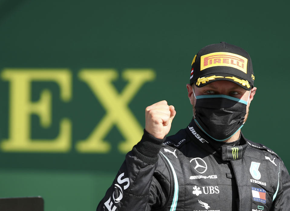 Race winner Mercedes driver Valtteri Bottas of Finland celebrates after winning the Austrian Formula One Grand Prix at the Red Bull Ring racetrack in Spielberg, Austria, Sunday, July 5, 2020. (Mark Thompson/Pool via AP)