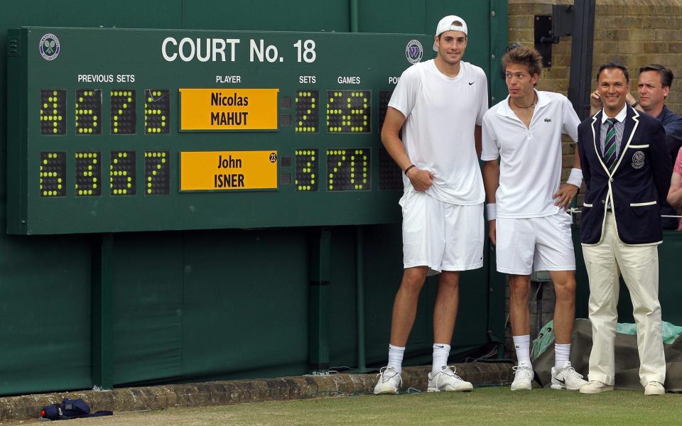 John Isner and Nicolas Mahut played out the longest match in Wimbledon history in 2010, at 11hrs 5mins with Isner winning the final set 70-68 - Getty Images