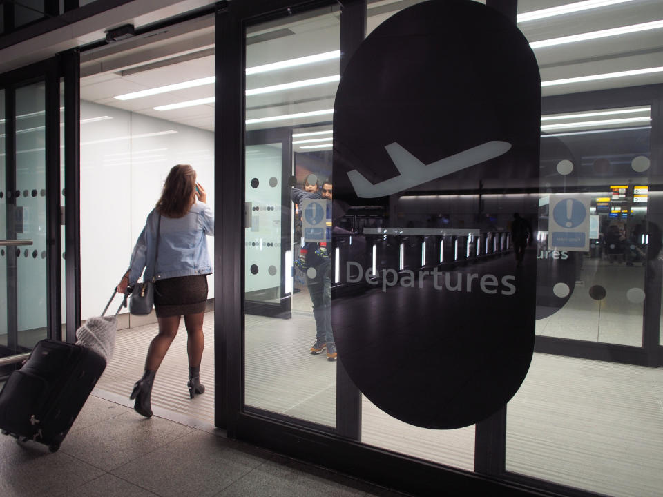 Passengers in Terminal 2 at Heathrow airport after departures were temporarily suspended following "reports of drones" at the airport.