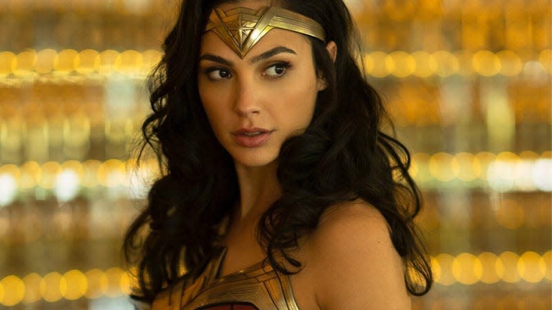 Wonder Woman looks skeptically over her left shoulder.