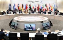 Japan's Prime Minister Abe speaks during the G20 summit in Osaka