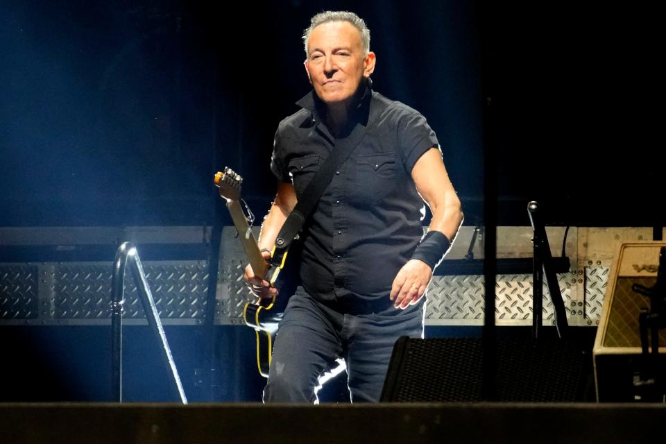 Bruce Springsteen walks onto the stage at MetLife Stadium, in East Rutherford. Wednesday, August 30, 2023