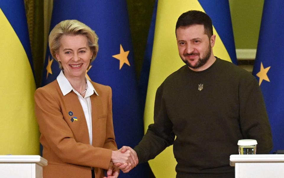 Volodymyr Zelensky and Ursula von der Leyen shake hands after a joint press conference on Thursday. Brussels has already granted Kyiv EU candidate status - Sergei Supinsky/AFP via Getty Images