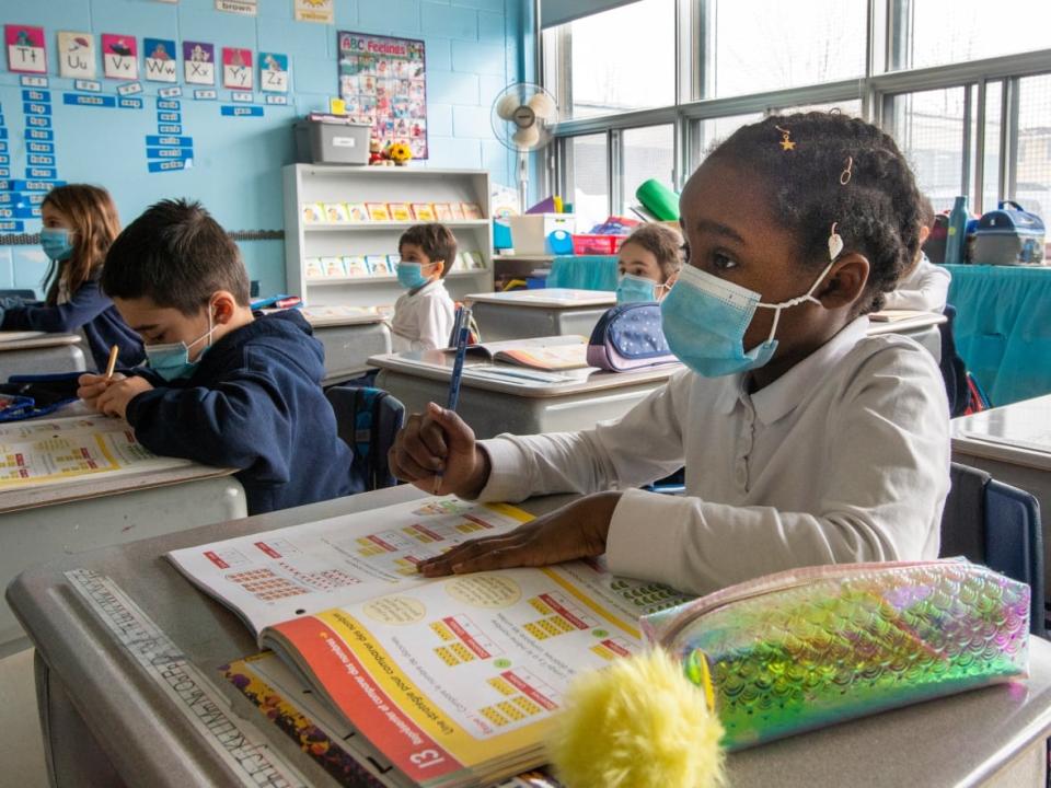 The pediatrics section of the Alberta Medical Association, which is made up of over  300 physicians, is calling for temporary masking requirements in schools as pediatric hospitals are overwhelmed with a surge of viral illnesses. (Ryan Remiorz/The Canadian Press - image credit)