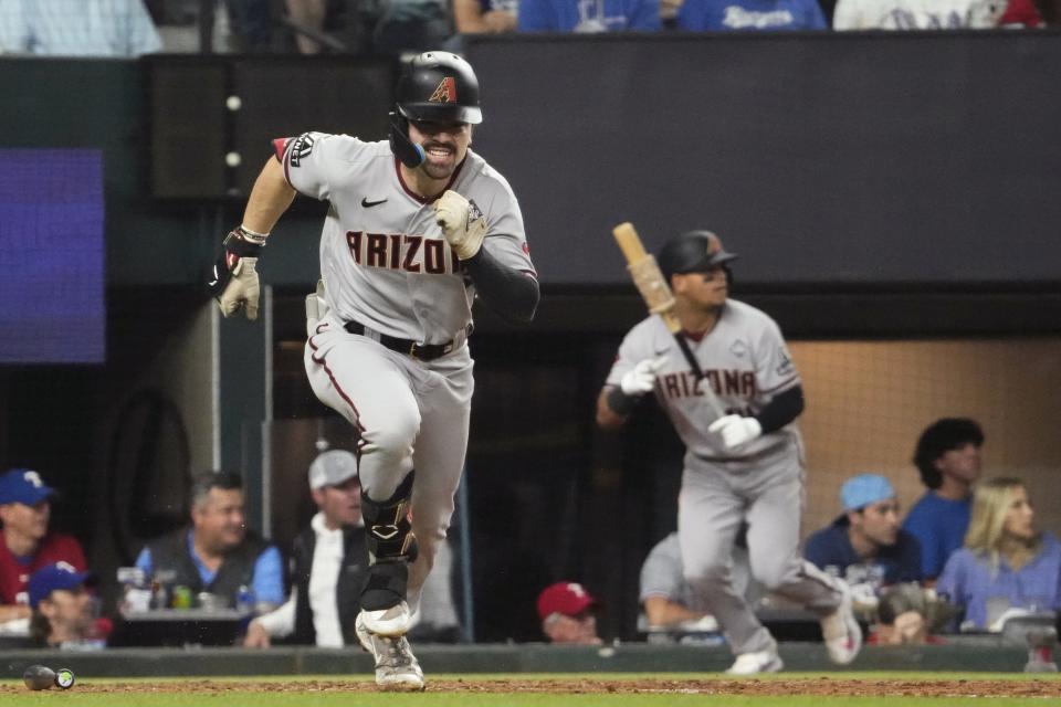 Arizona Diamondbacks right fielder Corbin Carroll (7) hits an RBI single against the Texas Rangers during the seventh inning in game two of the 2023 World Series at Globe Life Field on Oct. 28, 2023, in Arlington, Texas.