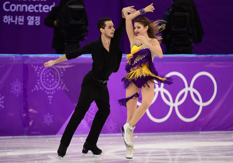 <p>Ukraine’s Maxim Nikitin and Alexandra Nazarova perform during the ice dance short dance of the figure skating event during the Pyeongchang 2018 Winter Olympic Games at the Gangneung Ice Arena in Gangneung on February 19, 2018. / AFP PHOTO / Roberto SCHMIDT </p>