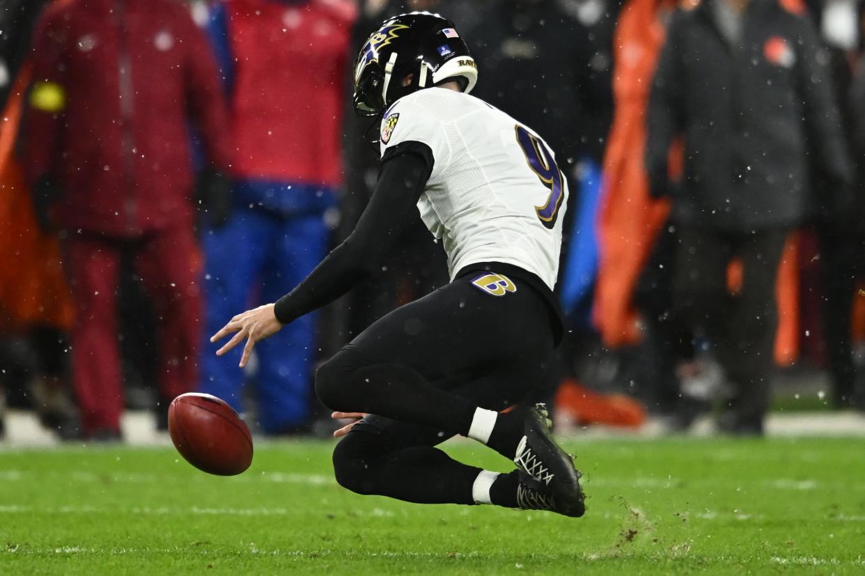 Dec 17, 2022; Cleveland, Ohio, USA; Baltimore Ravens place kicker Justin Tucker (9) recovers a blocked field goal during the second half against the Cleveland Browns at FirstEnergy Stadium. Mandatory Credit: Ken Blaze-USA TODAY Sports