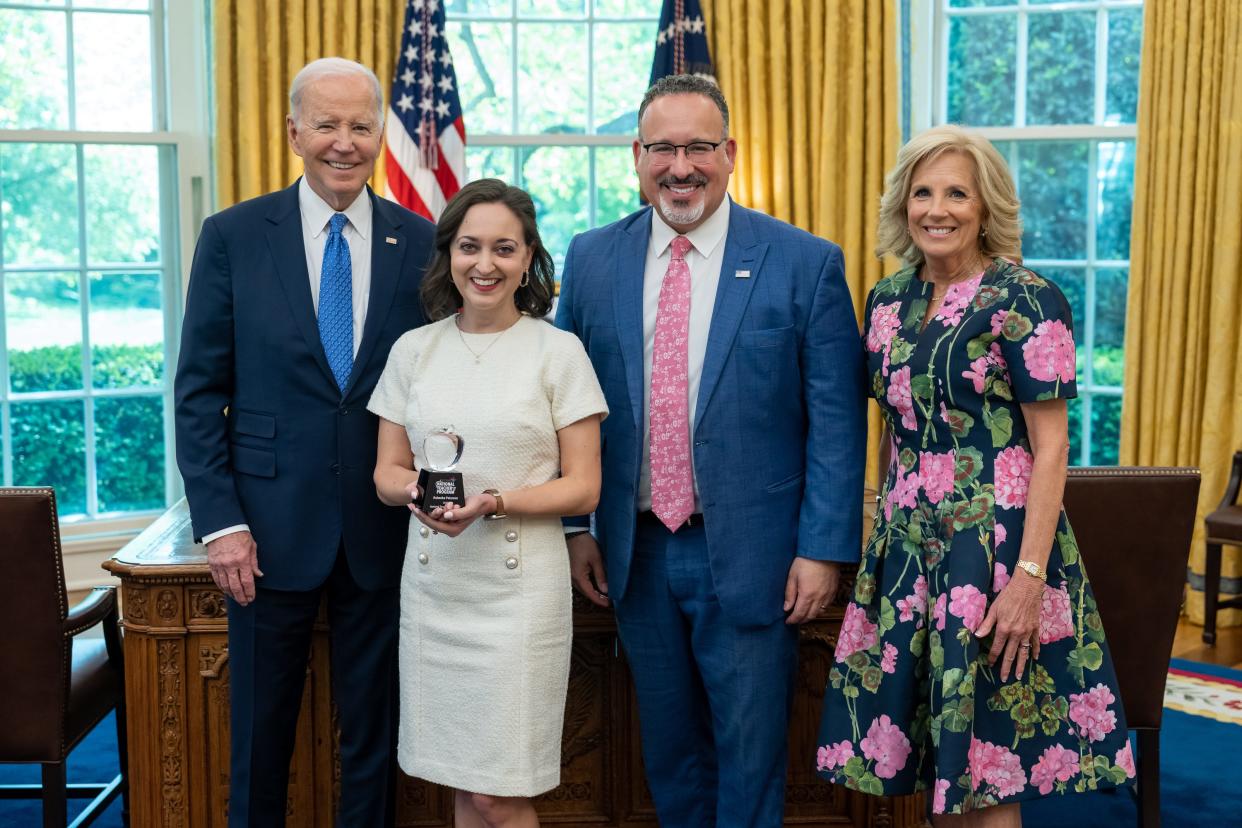 President Joe Biden takes a group photo with National Teacher of the Year Rebecka Peterson, U.S. Secretary of Education Miguel Cardona and first lady Jill Biden in April. Peterson teaches math in Tulsa, Oklahoma.