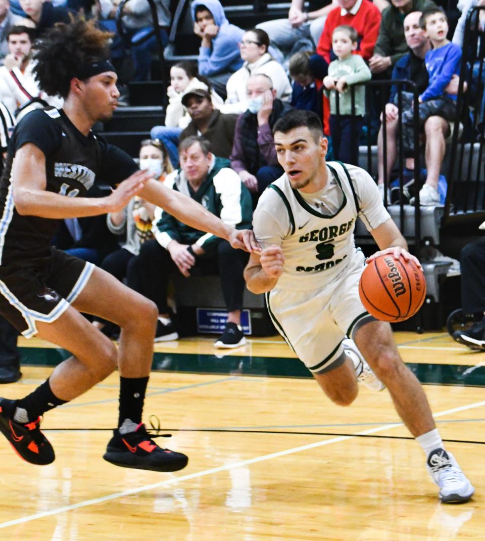 George School guard Dante Weise drives to the basket.