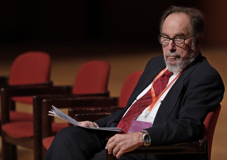 David Baltimore, Nobel laureate and chair of the organizing committee, listens to speakers during the Human Genome Editing Conference in Hong Kong, Thursday, Nov. 29, 2018. (AP Photo/Vincent Yu)