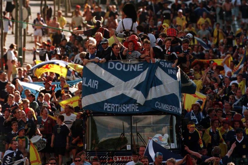 The Tartan Amy mobbed the bus on the way to the Morroco game in St Etienne.