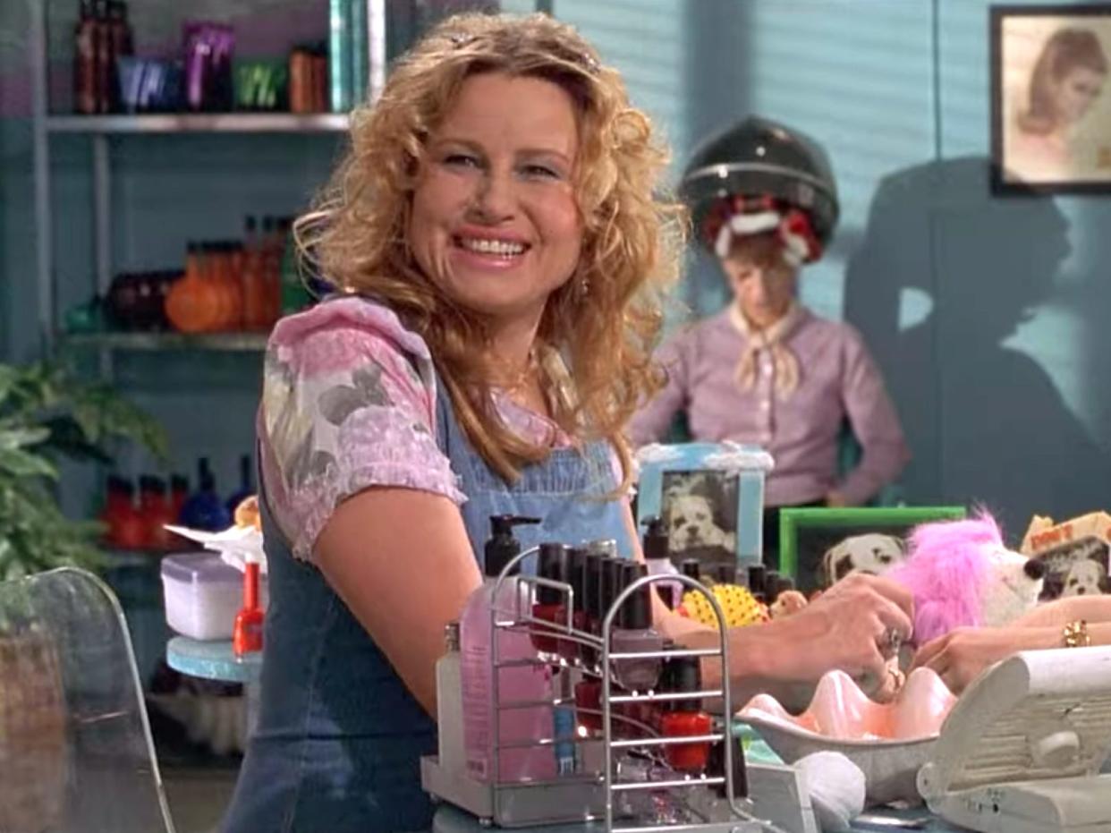 Jennifer Coolidge and Reese Witherspoon at a table at a nail salon in "Legally Blonde."