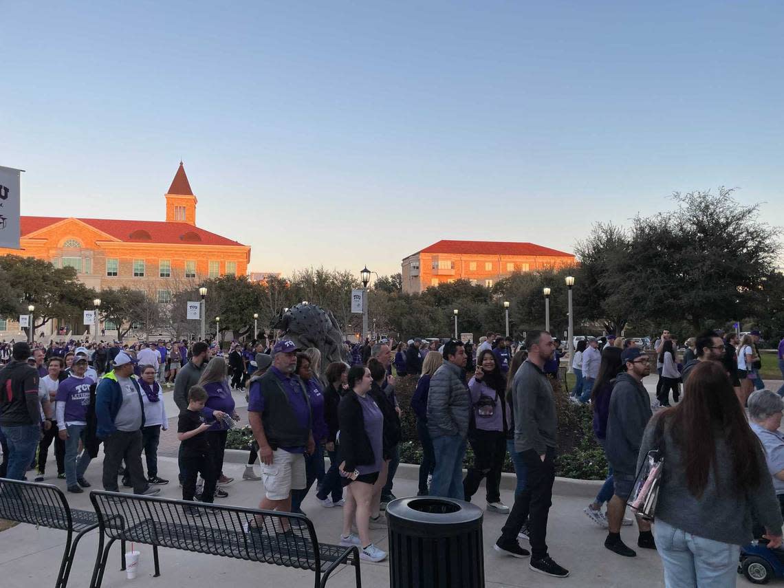 Horned Frogs football fans enter Schollmaier Arena on the TCU campus in Fort Worth for a watch party to cheer on the TCU team as they play Georgia for the national championship Monday, Jan. 9, 2023.