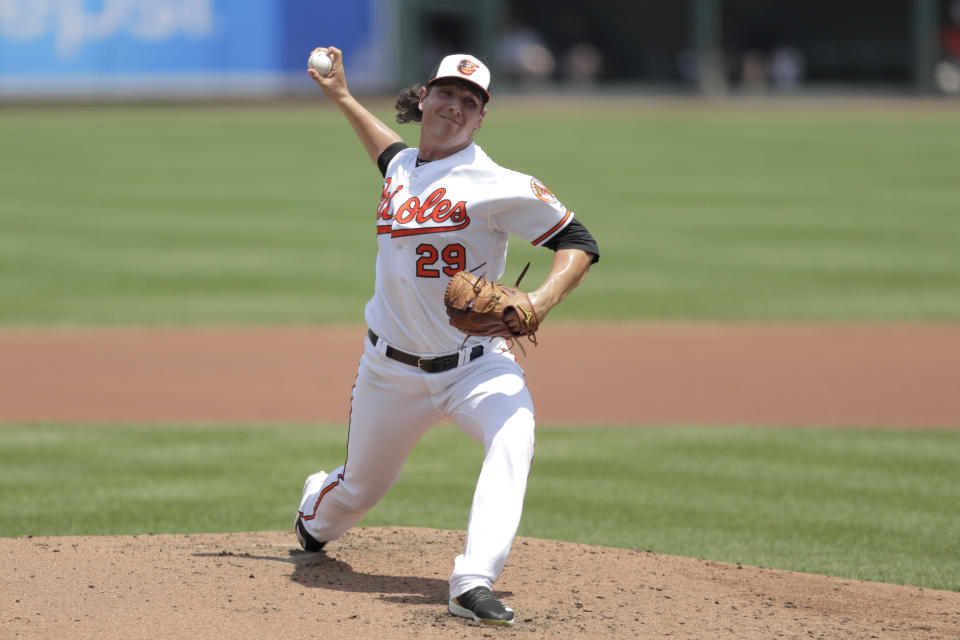 Baltimore Orioles starting pitcher Asher Wojciechowski pitches to a Boston Red Sox batter during the second inning of a baseball game, Sunday, July 21, 2019, in Baltimore. (AP Photo/Julio Cortez)