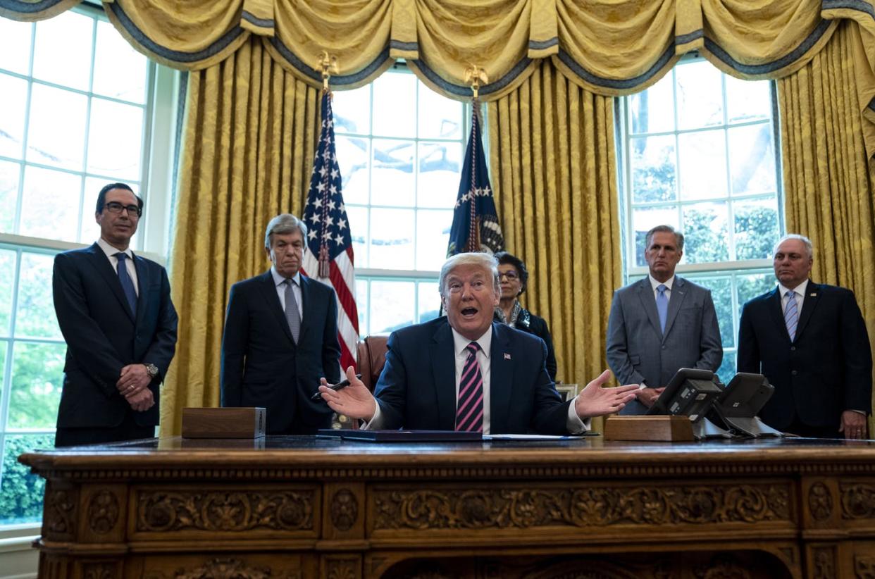 <span class="caption">The Trump administration was not alone with its slow response to the COVID-19 crisis.</span> <span class="attribution"><a class="link " href="https://www.gettyimages.com/detail/news-photo/president-donald-trump-participates-in-a-signing-ceremony-news-photo/1210884734?adppopup=true" rel="nofollow noopener" target="_blank" data-ylk="slk:Getty Images / White House Pool;elm:context_link;itc:0;sec:content-canvas">Getty Images / White House Pool</a></span>