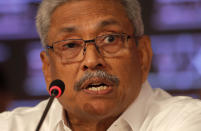 Sri Lankan presidential candidate and former defense chief Gotabaya Rajapaksa speaks during a news conference in Colombo, Sri Lanka, Tuesday, Oct. 15, 2019. Rajapaksa, who's a front-runner in next month's presidential election says if he wins he won't recognize an agreement the government made with the U.N. human rights council to investigate alleged war crimes during the nation's civil war. (AP Photo/Eranga Jayawardena)