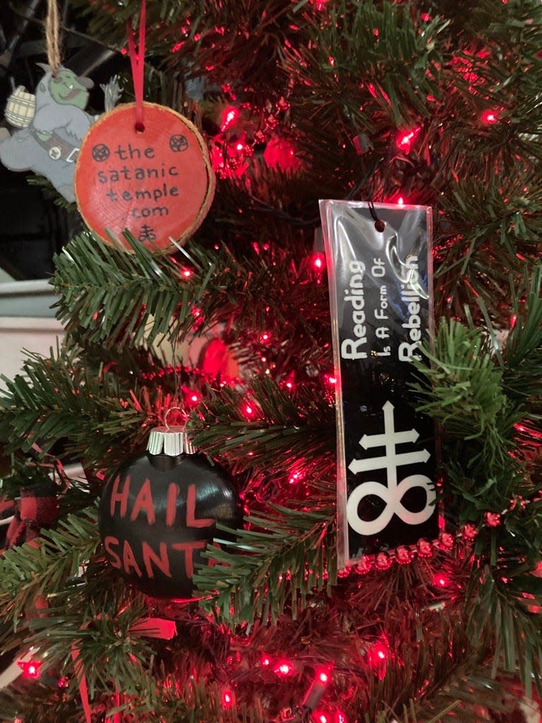 The Satanic Temple of Wisconsin joined this year's Festival of Trees at the National Railroad Museum in Ashwaubenon. Although its name may shock some visitors, the organization says it stands for peace, equality, empathy and an end to tyrannical thinking and injustice.