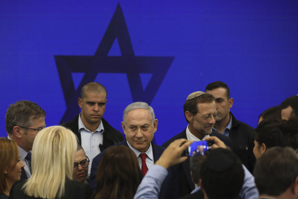 Israeli Prime Minister Benjamin Netanyahu leaves following a press conference in Tel Aviv, Israel, Tuesday, Sept. 10, 2019. Netanyahu vowed Tuesday to begin annexing West Bank settlements if he wins national elections next week. (AP Photo/Oded Balilty)