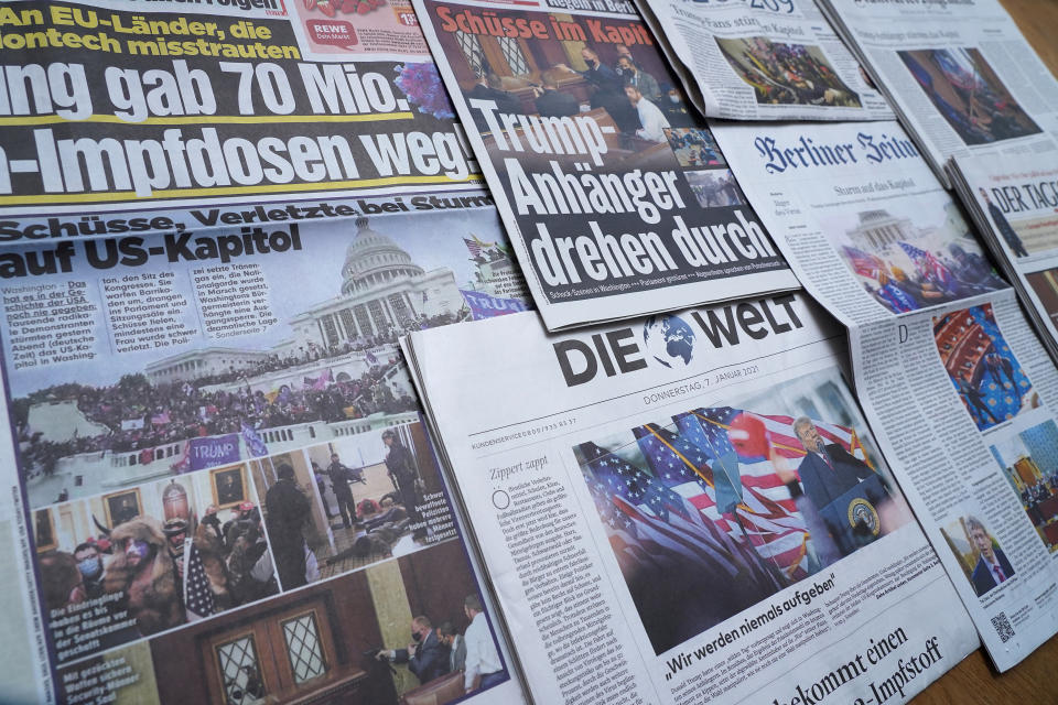 BERLIN, GERMANY - JANUARY 07: In this photo illustration, Newspaper front pages show yesterday's storming by supporters of U.S. President Donald Trump of the U.S. Capitol on January 7, 2021 in Berlin, Germany. Politicians across the world have reacted with shock and dismay at the events in Washington, D.C., in which Trump supporters, egged on by Trump at a rally nearby earlier in the day, converged on the Capitol, broke into the building, challenged law enforcement officers and forced lawmakers, who were debating the electoral college count to certify the U.S. presidential victory of Joe Biden, to flee to safety. (Photo by Sean Gallup/Getty Images)