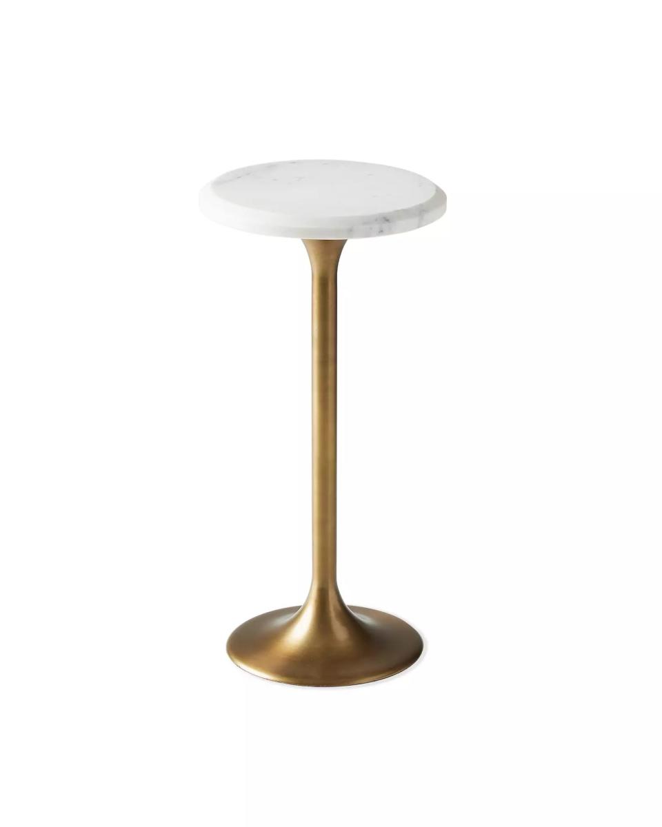 <p><a href="https://go.redirectingat.com?id=74968X1596630&url=https%3A%2F%2Fwww.serenaandlily.com%2Fproducts%2Fkennington-martini-table%2F1076801&sref=https%3A%2F%2Fwww.veranda.com%2Fshopping%2Fhome-accessories%2Fg60674273%2Fcozy-gifts-home%2F" rel="nofollow noopener" target="_blank" data-ylk="slk:Shop Now;elm:context_link;itc:0;sec:content-canvas" class="link ">Shop Now</a></p><p>Kennington Martini Table</p><p>$398.00</p>