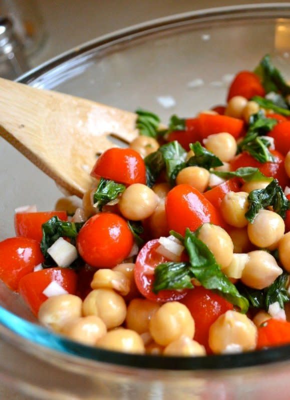 <p>Rachel Schultz</p><p>Nothing says summer like an easy, fresh tomato and chickpea salad!</p><p><a href="http://rachelschultz.com/2013/01/19/tomato-chickpea-salad/" rel="nofollow noopener" target="_blank" data-ylk="slk:Get the recipe!;elm:context_link;itc:0;sec:content-canvas" class="link rapid-noclick-resp">Get the recipe!</a></p><p><strong>Related: <a href="https://parade.com/1184710/jocelyndelkadams/spring-side-dish-recipes/" rel="nofollow noopener" target="_blank" data-ylk="slk:23 Vibrant Spring Side Dishes;elm:context_link;itc:0;sec:content-canvas" class="link rapid-noclick-resp">23 Vibrant Spring Side Dishes </a></strong></p>