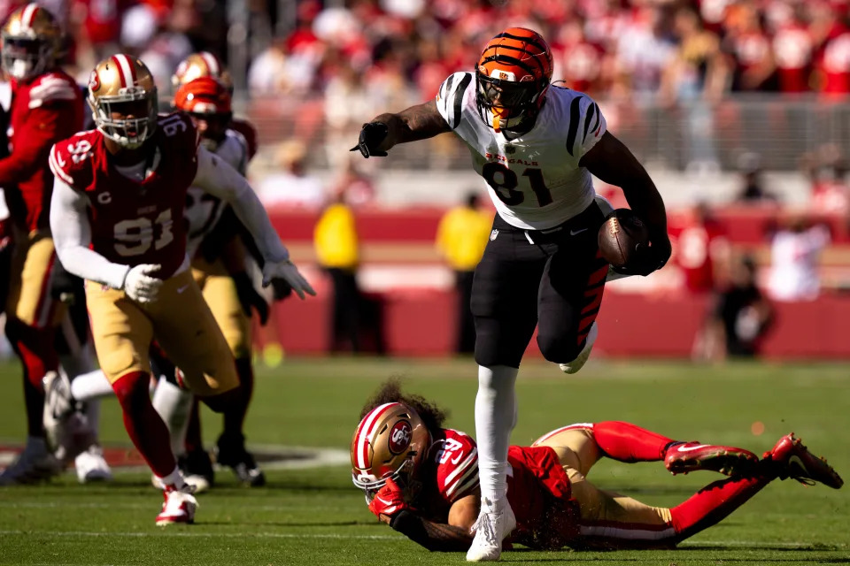 Cincinnati Bengals tight end Irv Smith Jr. (81) breaks a tackle attempt by San Francisco 49ers safety Talanoa Hufanga (29) in the second quarter of the NFL game between the Cincinnati Bengals and the San Francisco 49ers at Levi Stadium in Santa Clara, Calif., on Sunday, Oct 29, 2023.