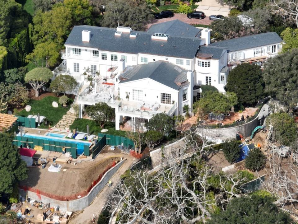 A closer-up shot of the Beverly Hills spread, where construction is visibly underway. BACKGRID