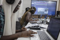 Students compose a music at a beat making class for women in Dakar, Senegal, Wednesday, Aug. 14, 2024. (AP Photo/Annika Hammerschlag)