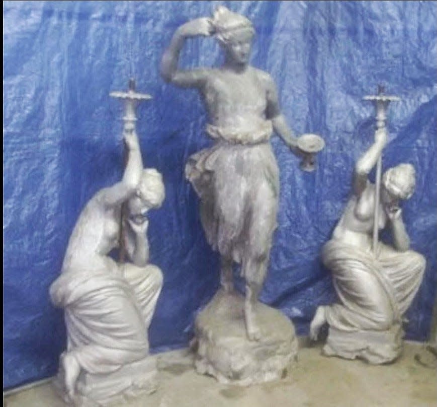 Three statues once part of a fountain on the Coshocton County Court Square that went dormant in 1949 are up for auction through Feb. 24.