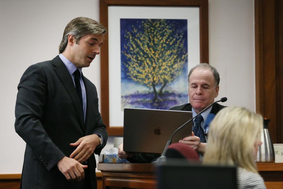 Andino Reynal, a lawyer for Alex Jones, questions psychiatrist Roy Lubit on Monday during the trial to determine damages Jones owes for defaming the parents of a Sandy Hook student by calling the massacre a hoax.